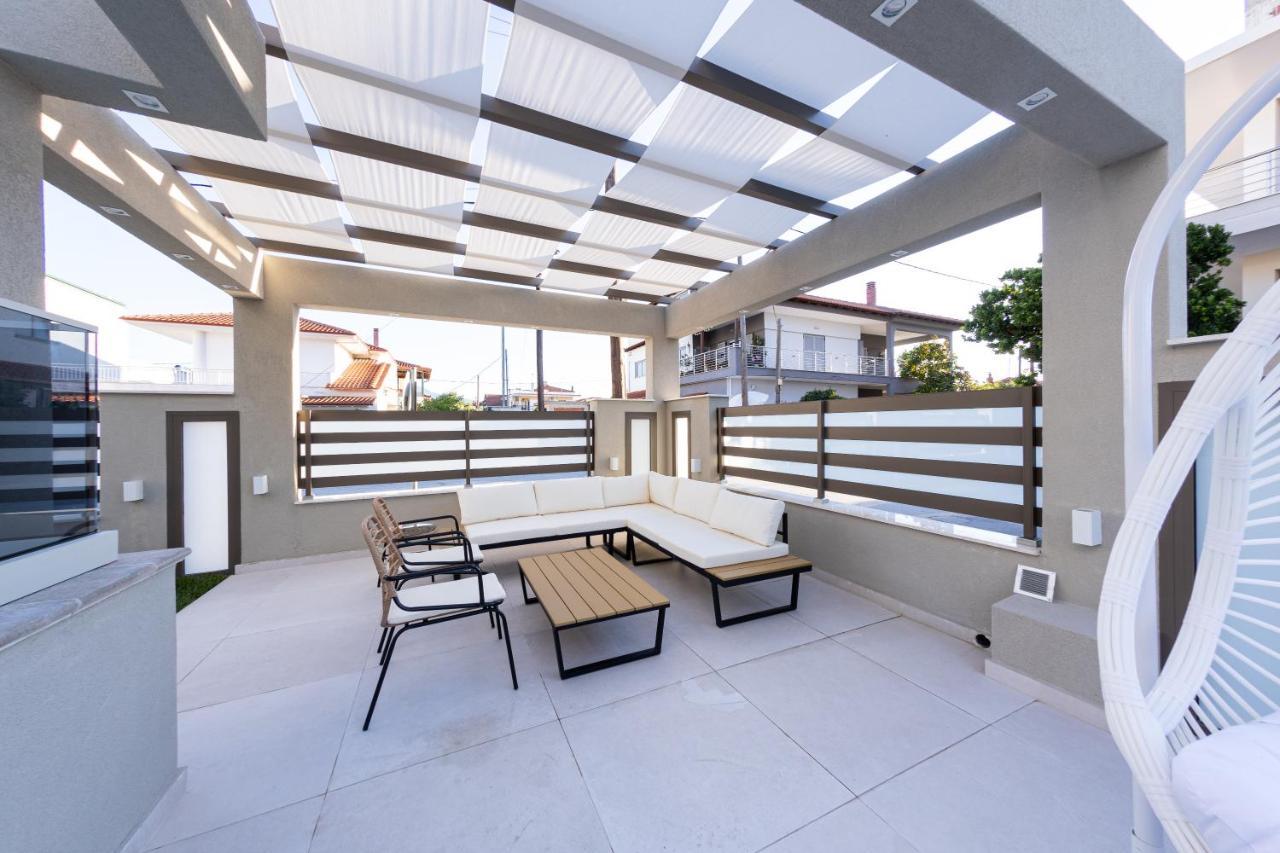 Ammos Luxury Apartments เนอาวรัสนา ภายนอก รูปภาพ